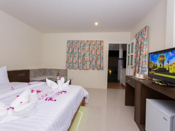 Suksompong Resort : photo 7 de la chambre chambre double ou lits jumeaux deluxe – vue sur jardin