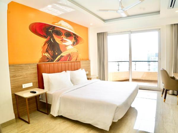 Alivaa Hotel Gurugram Sohna Road City Center : photo 1 de la chambre chambre supérieure lit queen-size