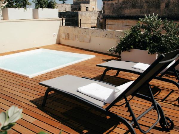 Fiermonte Museum by La Fiermontina : photo 8 de la chambre suite lit king-size avec baignoire spa