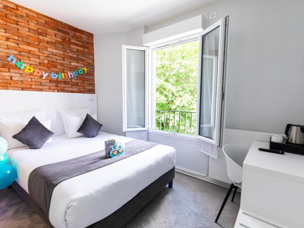 HOTEL DE PARIS MONTPARNASSE : photo 1 de la chambre chambre double supérieure avec baignoire - vue sur jardin