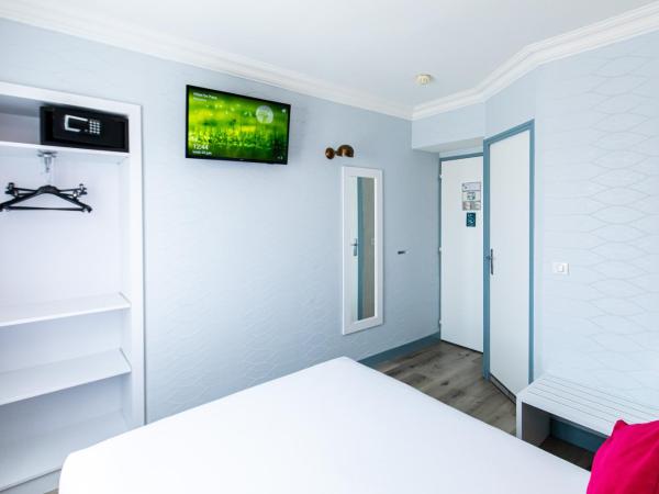 HOTEL DE PARIS MONTPARNASSE : photo 2 de la chambre chambre double supérieure avec baignoire - vue sur jardin