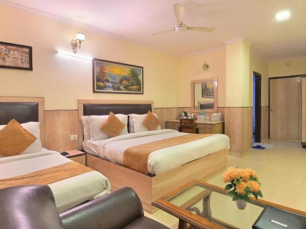 Hotel Castle Blue New Delhi Near IGI Airport : photo 1 de la chambre chambre triple