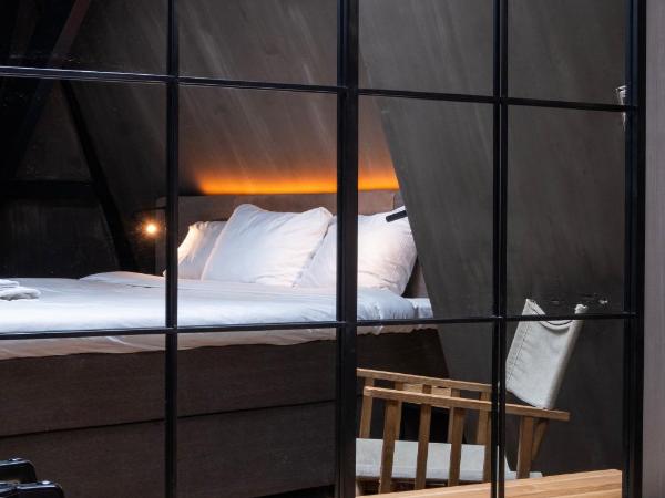 City Center Lodge Utrecht : photo 4 de la chambre hébergement lit king-size