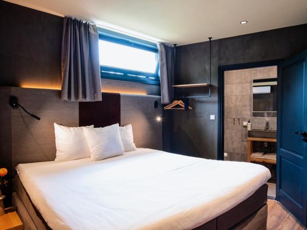 City Center Lodge Utrecht : photo 4 de la chambre chambre lit queen-size