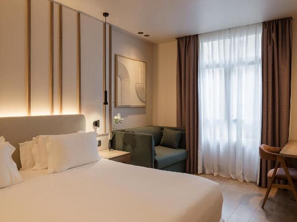 H10 Puerta de Alcalá : photo 2 de la chambre chambre supérieure familiale (3 adultes)