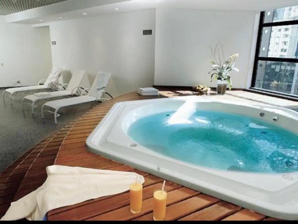 Grand Plaza Paulista Hotel : photo 8 de la chambre chambre quadruple avec baignoire