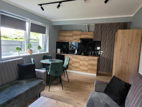 BŁĘKITNA 37 apartamenty : photo 2 de la chambre chambre quadruple avec salle de bains privative