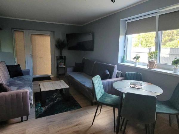 BŁĘKITNA 37 apartamenty : photo 7 de la chambre chambre quadruple avec salle de bains privative