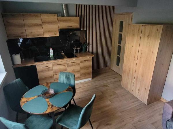 BŁĘKITNA 37 apartamenty : photo 1 de la chambre chambre quadruple avec salle de bains privative