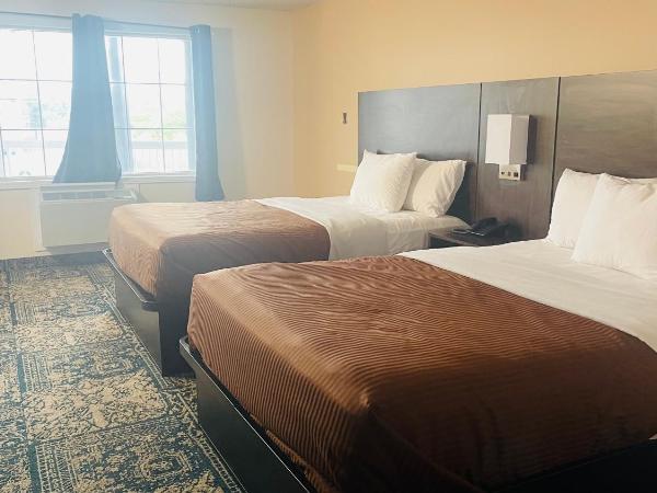 Falls Lodge & Suites : photo 1 de la chambre chambre lit queen-size 