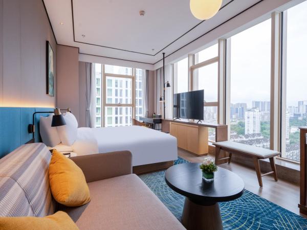 Hilton Garden Inn Hangzhou Xixi Zijingang : photo 9 de la chambre chambre lit king-size supérieure