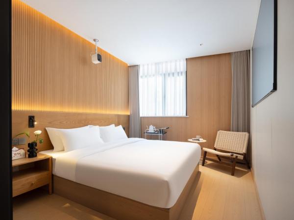 Shanghai Captain 5 Youth Hotel - Xinzhuang Metro Station : photo 2 de la chambre chambre double