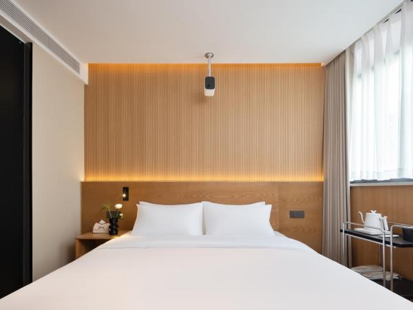 Shanghai Captain 5 Youth Hotel - Xinzhuang Metro Station : photo 3 de la chambre chambre double