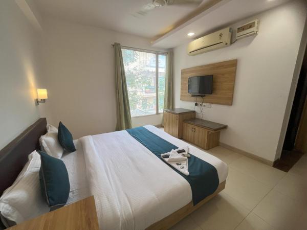 Pacific Inn Green, Gurgaon : photo 2 de la chambre chambre lit king-size