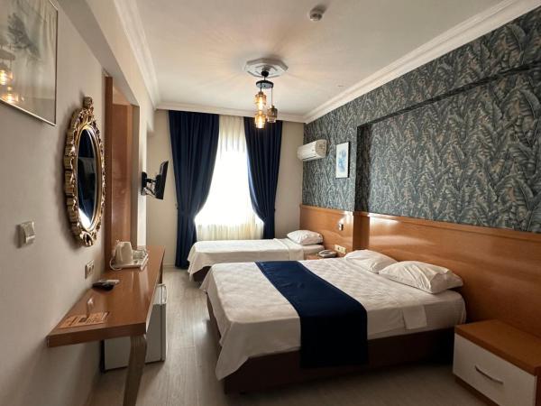 Serenity suites Hotel : photo 1 de la chambre chambre triple standard