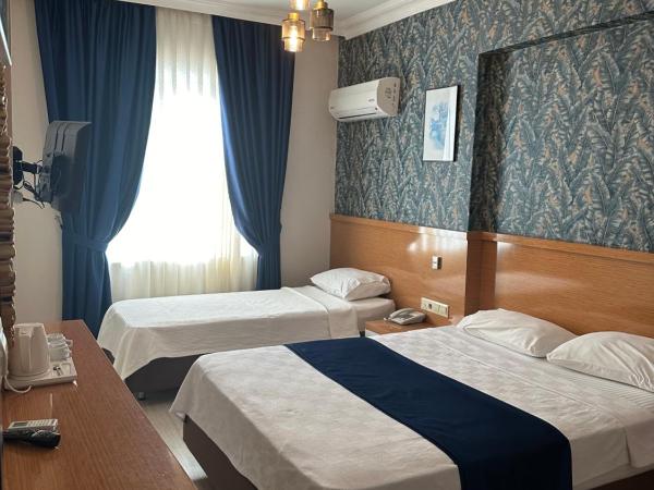 Serenity suites Hotel : photo 2 de la chambre chambre triple standard