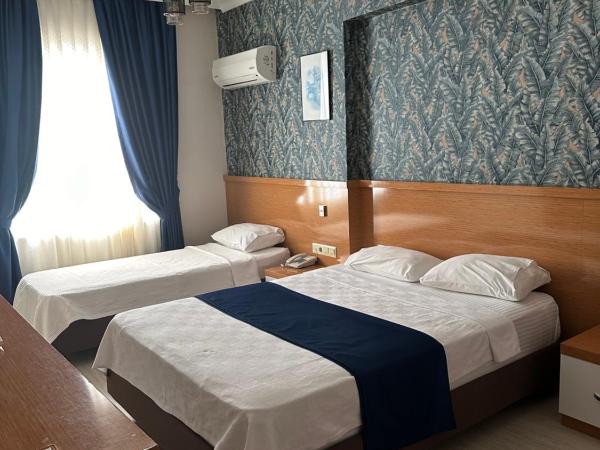 Serenity suites Hotel : photo 3 de la chambre chambre triple standard