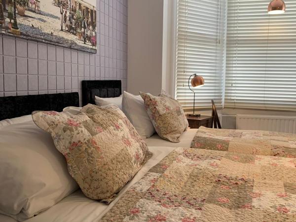 Relax Inn Guest House : photo 2 de la chambre chambre triple deluxe