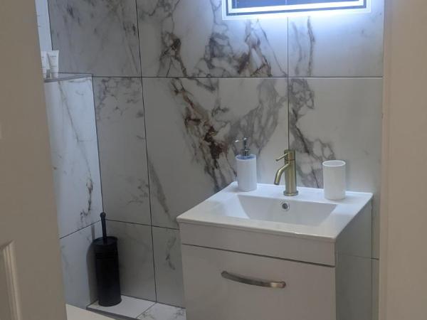 Relax Inn Guest House : photo 6 de la chambre chambre triple deluxe