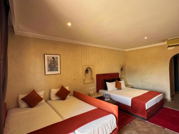 Palais Riad Berbère : photo 7 de la chambre chambre triple - vue sur jardin