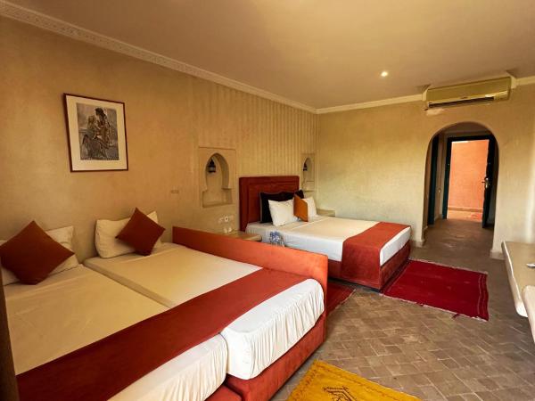 Palais Riad Berbère : photo 5 de la chambre chambre triple - vue sur jardin