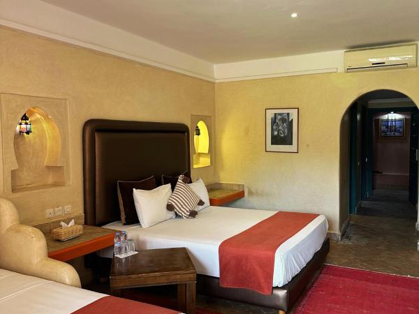 Palais Riad Berbère : photo 4 de la chambre chambre triple - vue sur jardin