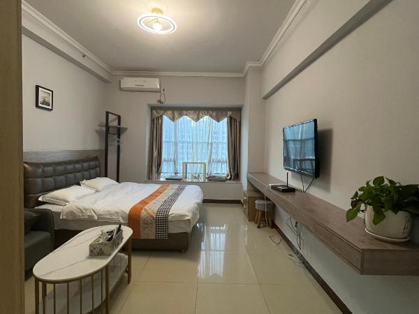 广州朴宿漫享公寓(琶洲国际会展中心店) : photo 4 de la chambre chambre lit queen-size