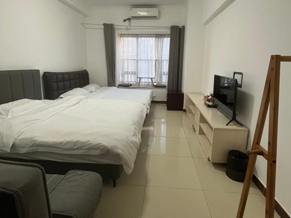 广州朴宿漫享公寓(琶洲国际会展中心店) : photo 5 de la chambre chambre lits jumeaux avec douche