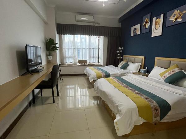 广州朴宿漫享公寓(琶洲国际会展中心店) : photo 3 de la chambre chambre lits jumeaux avec douche