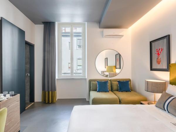 Le Mummarelle Napoli : photo 5 de la chambre comfort quadruple room – via santa lucia 133