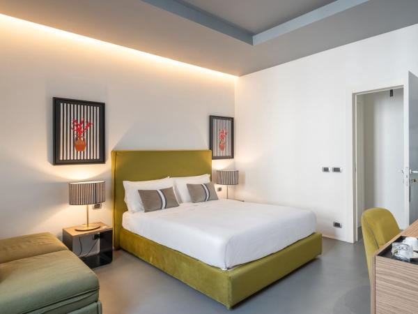 Le Mummarelle Napoli : photo 3 de la chambre comfort quadruple room – via santa lucia 133