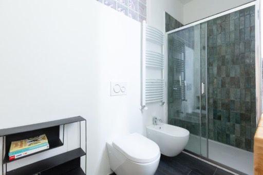 Milanohome : photo 3 de la chambre chambre double standard avec salle de bains commune