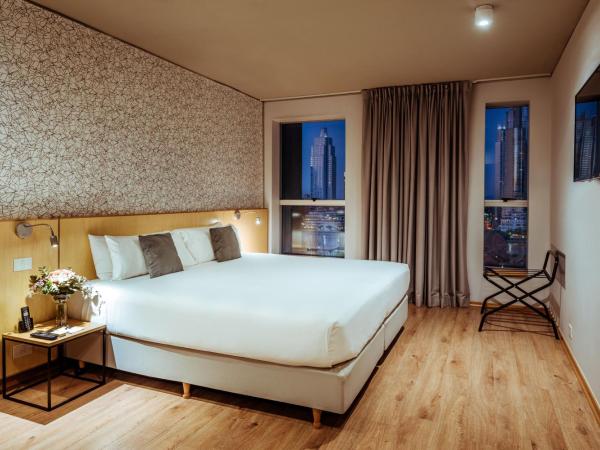 Pleno Madero : photo 1 de la chambre superior king room river view