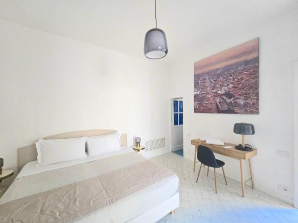 Sopramonte Exclusive Rooms : photo 9 de la chambre chambre quadruple standard