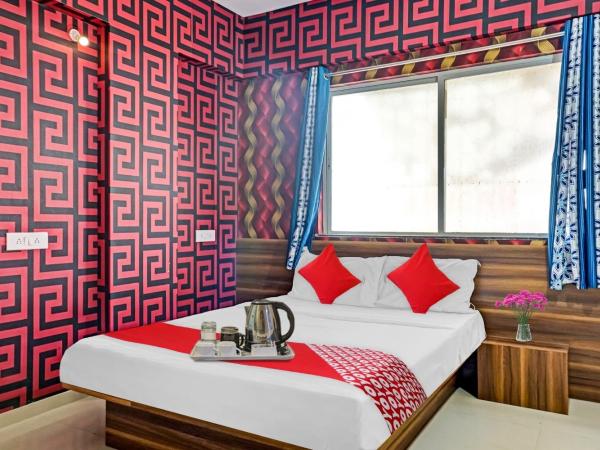 SPOT ON Swarg Executive Paradise Near Fun Time Multiplex : photo 9 de la chambre chambre triple classique