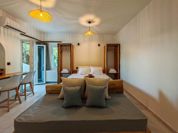 Paraga Suites : photo 6 de la chambre chambre triple avec balcon