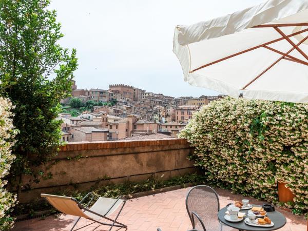 Hotel Minerva : photo 3 de la chambre chambre double supérieure - vue sur ville