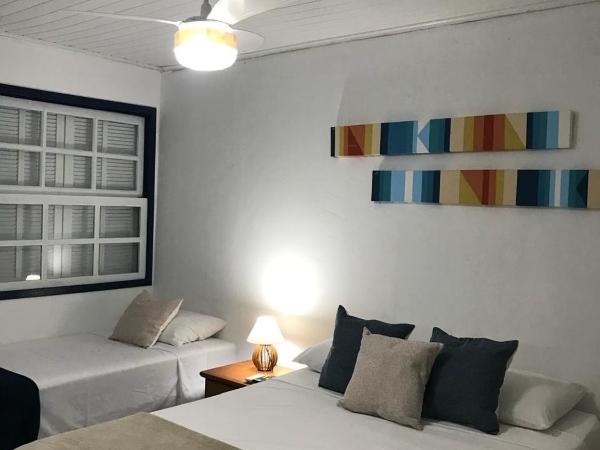 Brothers Suites Centro Búzios : photo 5 de la chambre chambre triple avec balcon