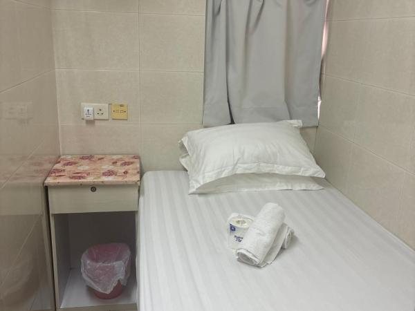 New Washington Guest House : photo 1 de la chambre chambre simple avec salle de bains commune