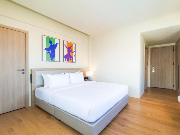 The One Bay Breeze : photo 1 de la chambre chambre deluxe double ou lits jumeaux