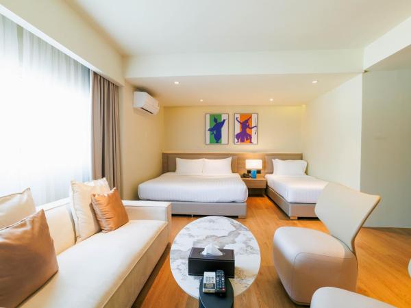 The One Bay Breeze : photo 2 de la chambre chambre triple supérieure