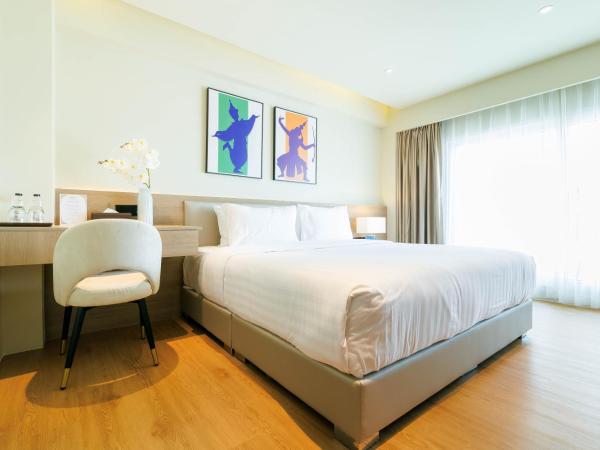 The One Bay Breeze : photo 2 de la chambre chambre double ou lits jumeaux deluxe avec balcon