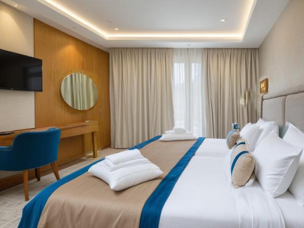 Kyriad Prestige City Center Tunis : photo 3 de la chambre suite exécutive avec 1 lit king-size