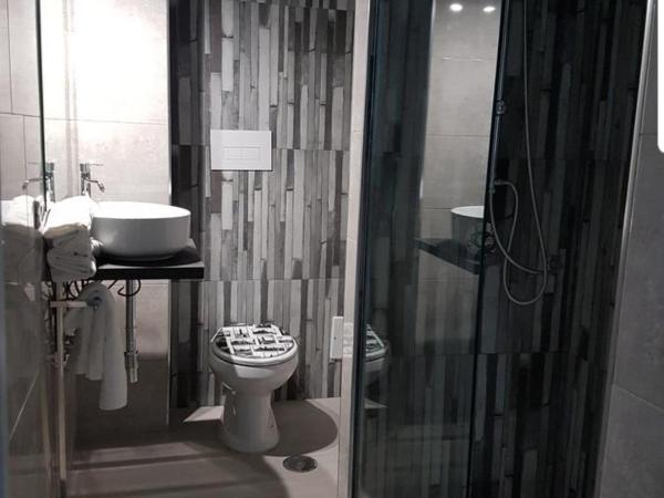 ESPOSITO PLAZA- ROOMS & SUITE : photo 3 de la chambre chambre quadruple Économique