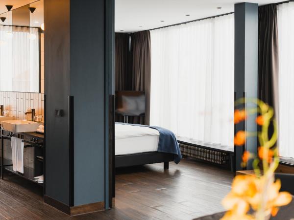 Exeter Hotel : photo 9 de la chambre suite avec accès au sauna et à la salle de sport - vue sur port