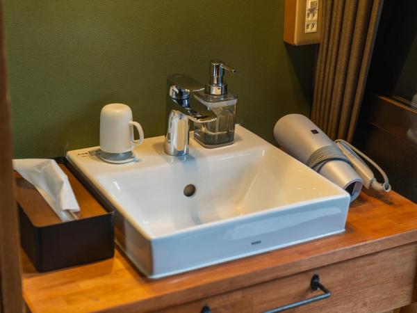 Guest House Hitsujian : photo 10 de la chambre chambre lits jumeaux - vue sur jardin