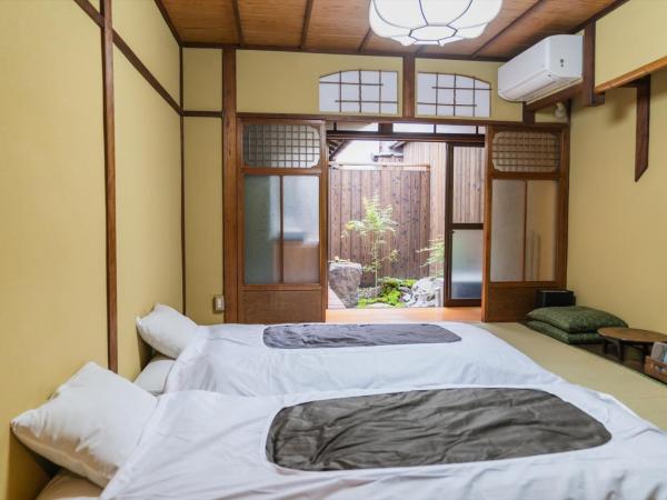 Guest House Hitsujian : photo 5 de la chambre chambre lits jumeaux - vue sur jardin