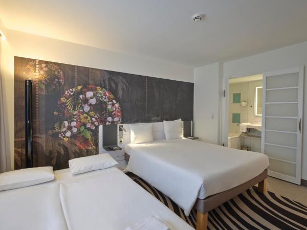 Novotel München City : photo 4 de la chambre chambre double standard avec canapé