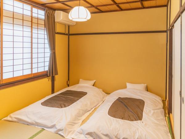 Guest House Hitsujian : photo 1 de la chambre chambre lits jumeaux