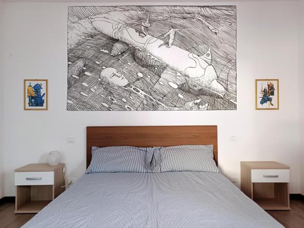 Nottetempo Verona : photo 7 de la chambre chambre de luxe (2 adultes + 1 enfant) avec salle de bains commune